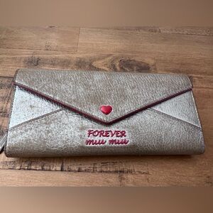 Miu miu love letter metallic champagne wallet in great condition